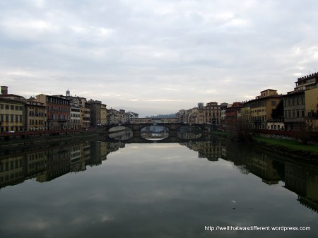 The Arno river with Ponte Vecchio in the background.