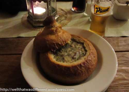 Zurek (sour rye soup) in a bread bowl. Definitely my favorite Polish dish so far.