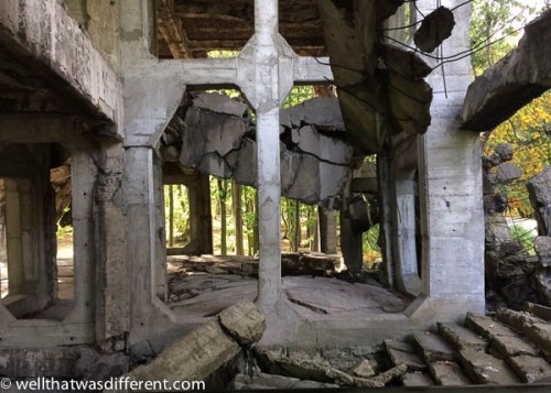 Bombed-out barracks in the woods.
